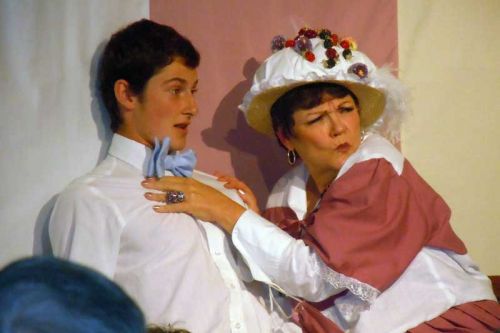 Klutzy ex chorus girl Parfait Deluxe (Connie Shibley) puts the moves on the innocent hero Robin Baskins (Cody Steeves) in the Bellrock Schoolhouse Theatre's production of “The Great Ice Cream Scheme” at the Bellrock Schoolhouse Theatre